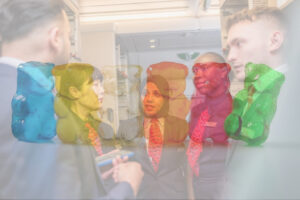 British Airways Cabin Crew Rushed To Hospital After Consuming Cannabis-Laced Gummies From Passenger a group of people looking at a group of people