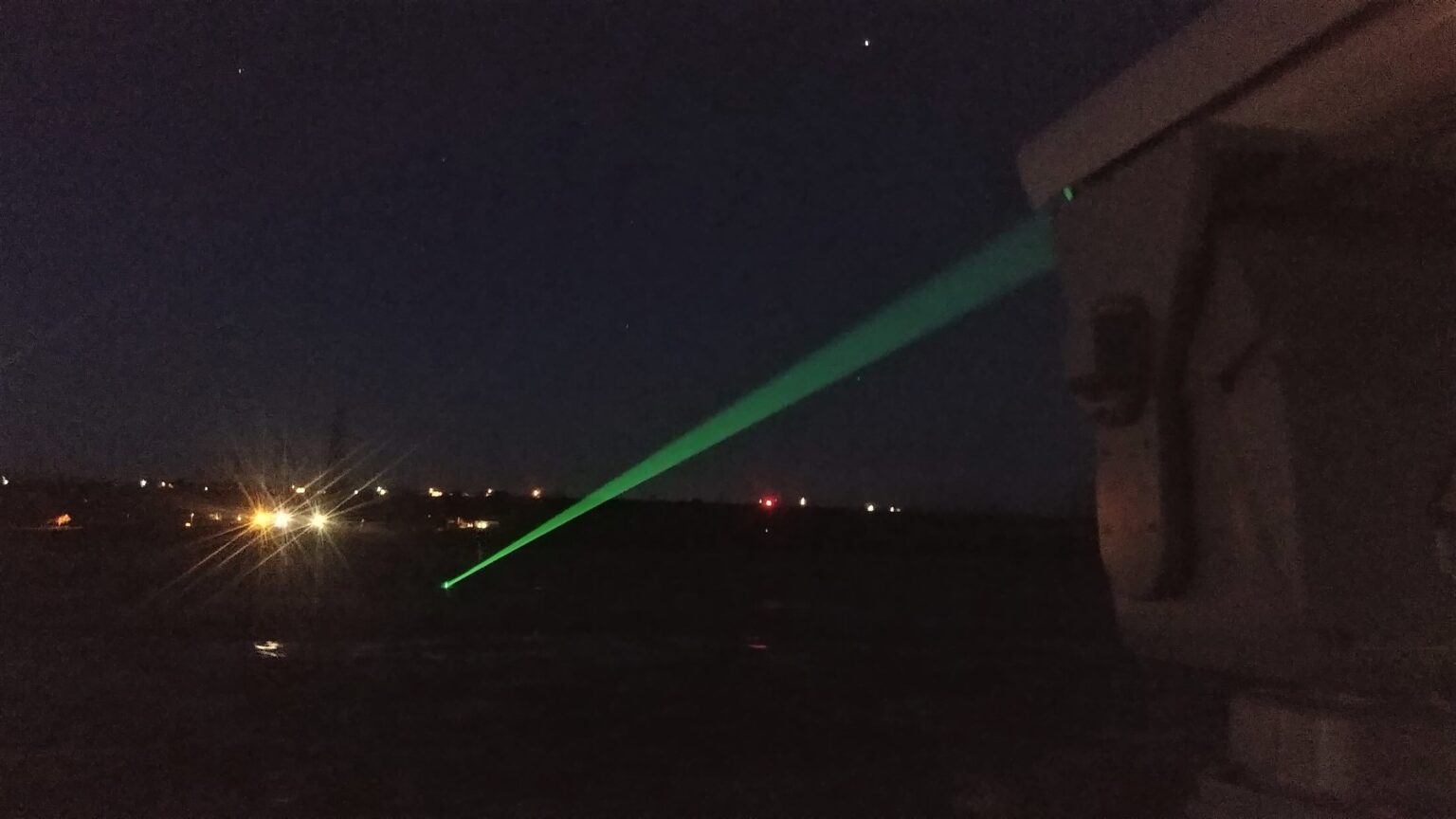 a laser beam at night