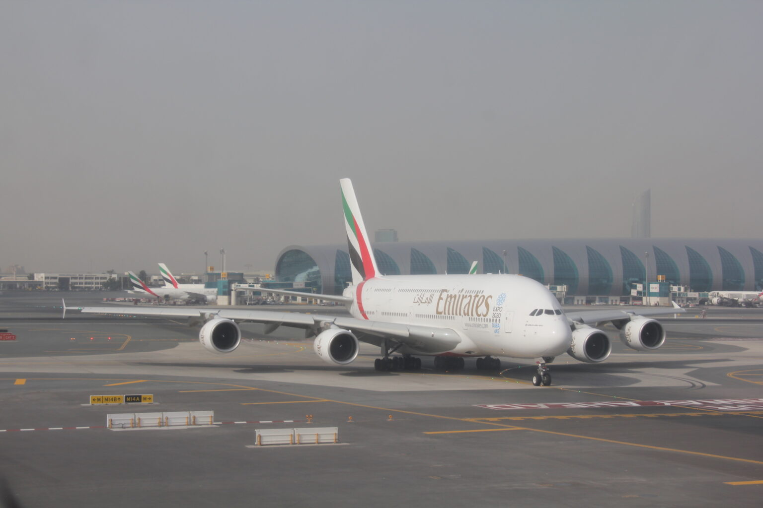 Middle East Airspace Shuts Down As Israel, U.S. Strike Iran, Triggering Global Flight Chaos an airplane on the runway