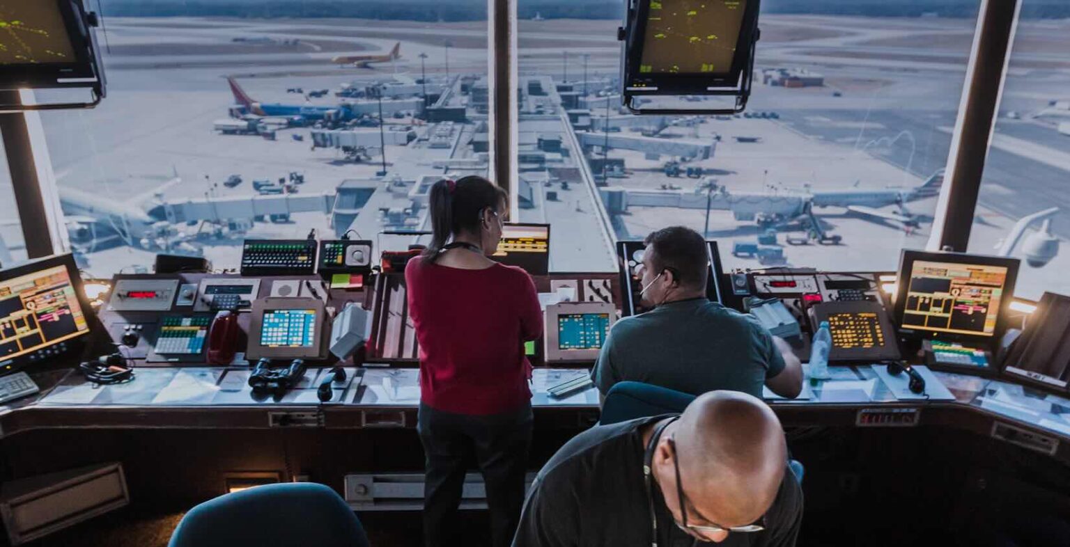 How The FAA Handles Civilian Airspace When Military Operations Intersect people in a control room