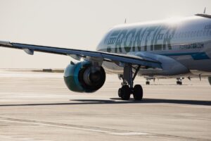 Frontier Airlines Is Retreating From JFK After Just Two Years the wing of a plane