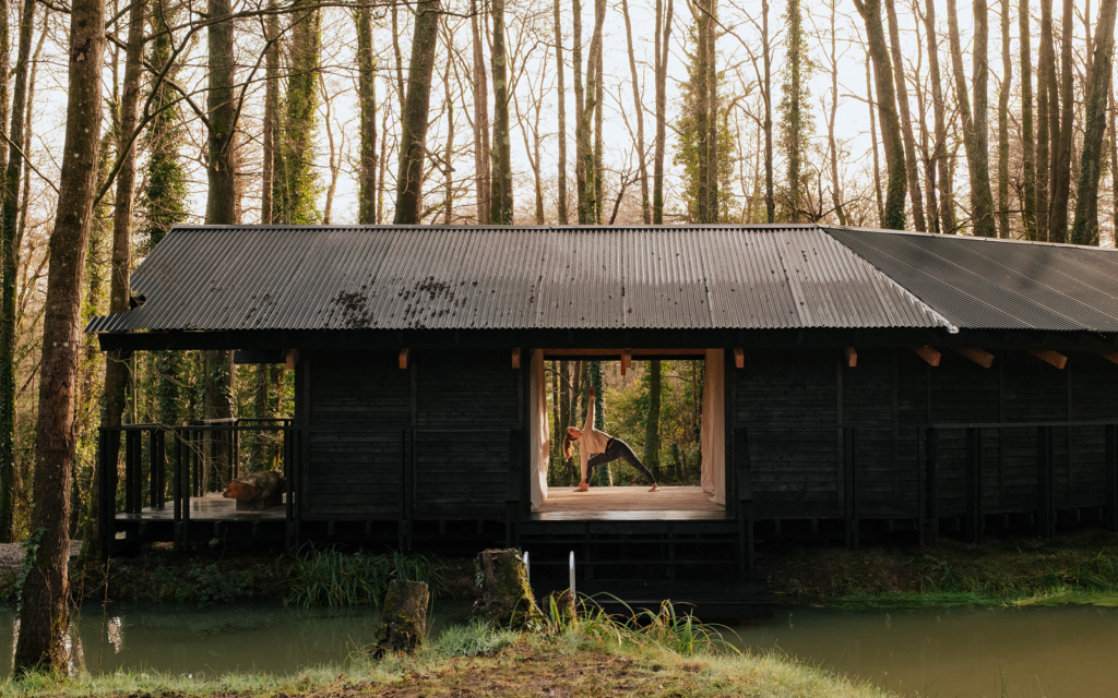 Architects Holiday expands with two new design-led cabins forest cabin with yoga platform