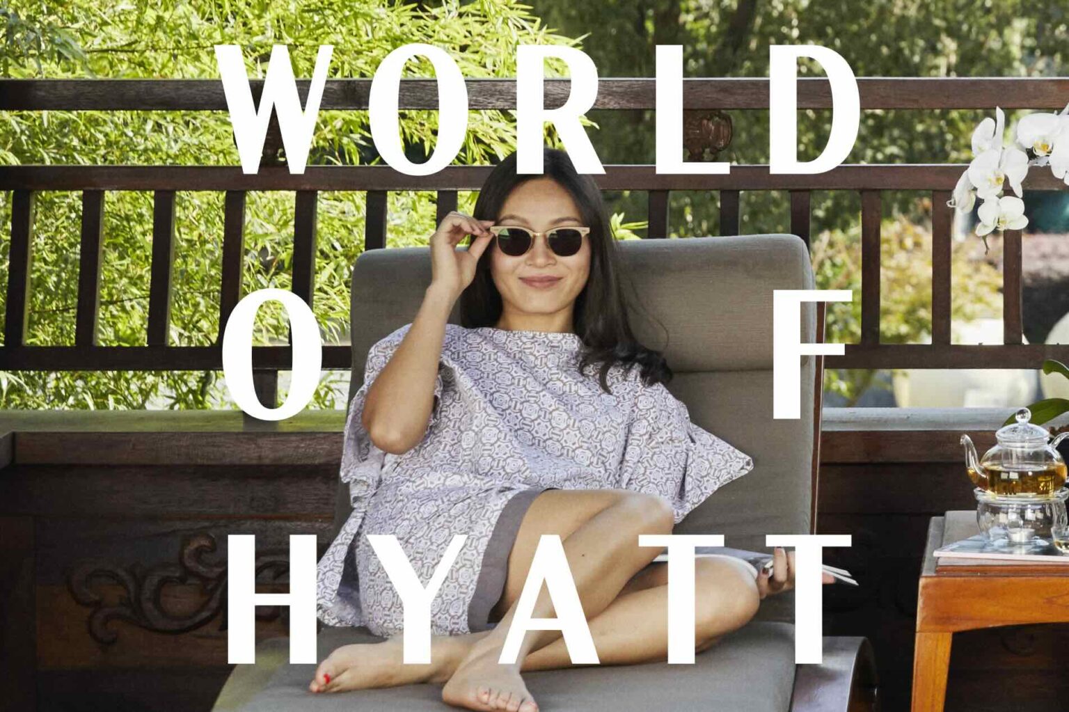Fake News: Category 10 Hotels, Super Peak Pricing, And A $795 Premium Credit Card Could Redefine World of Hyatt a woman sitting on a chair