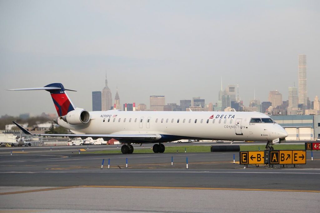 “Hacking” Or Union Organizing? Airline Sues Two Pilots Over Employee Data Access a plane on the runway