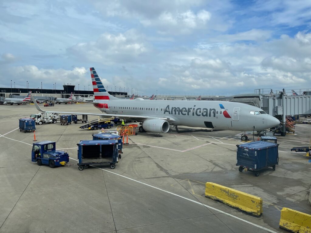 American Airlines Accuses United Airlines Of Chicago O’Hare Growth ‘Ploy’ To Block Competition an airplane at an airport