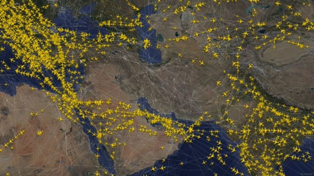a map of the world with yellow airplanes