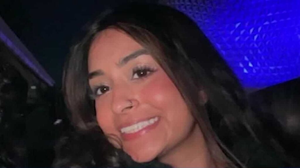 a woman smiling at the camera