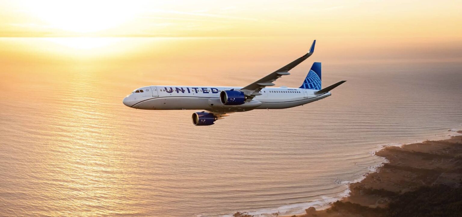 a plane flying over water
