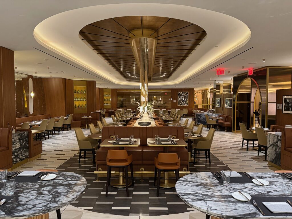 a restaurant with tables and chairs