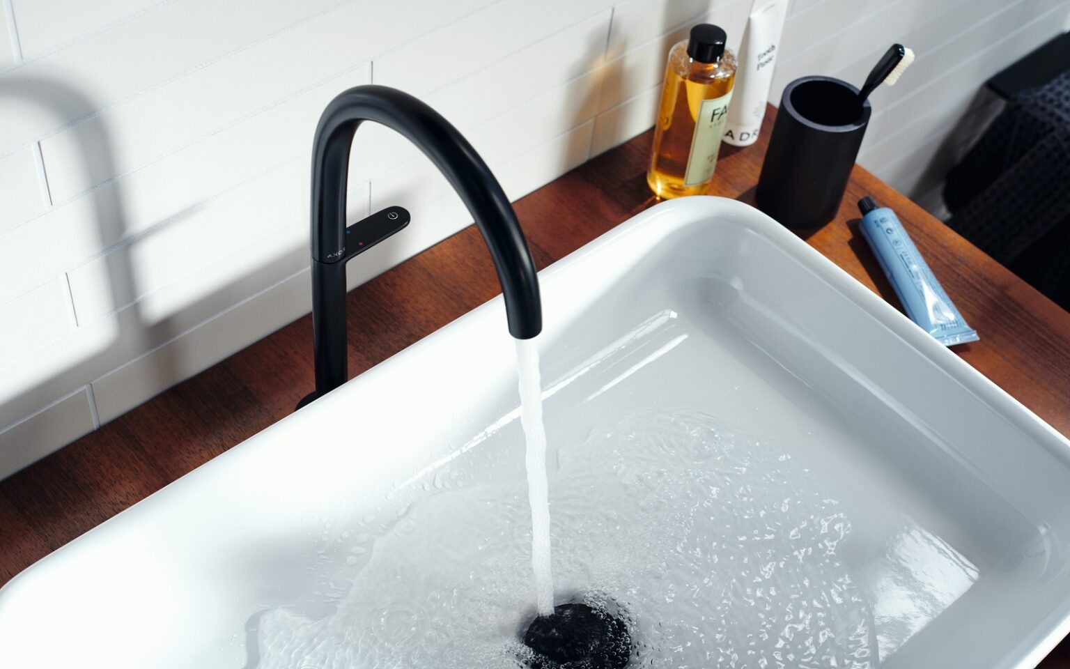 Case Study: AXOR One brings sculptural simplicity to Princess Yachts’ X90 models black axor one tap over basin