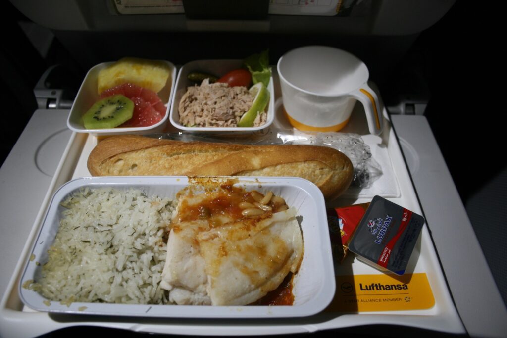 a tray of food on a plane