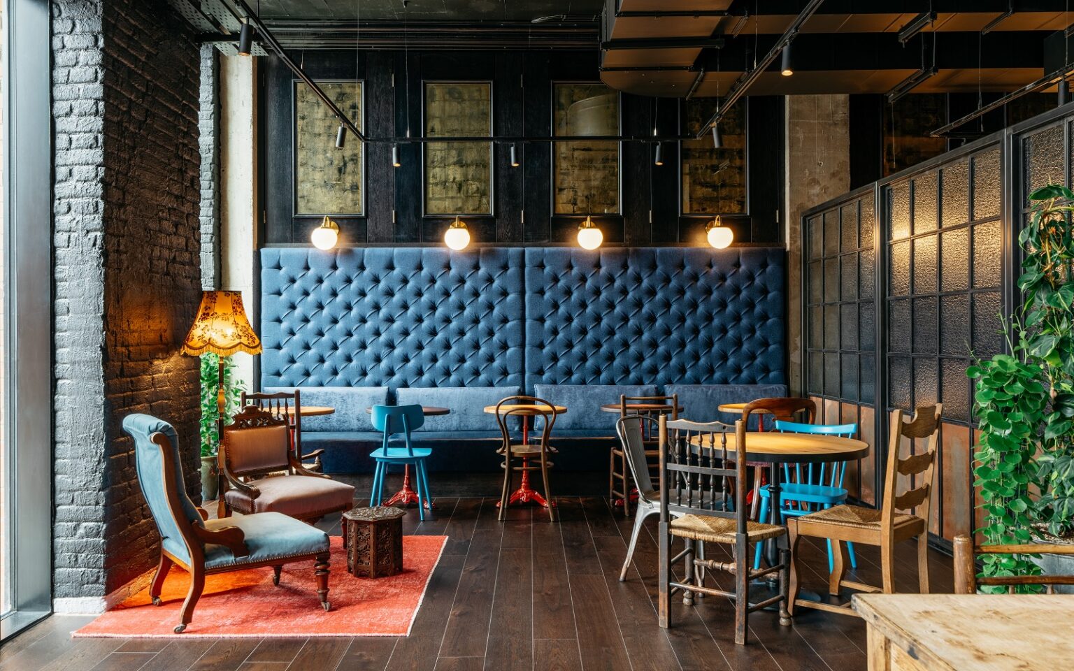 Ruby Hotels takes on the Big Apple blue banquette and eclectic wooden chairs in Ruby Molly Dublin
