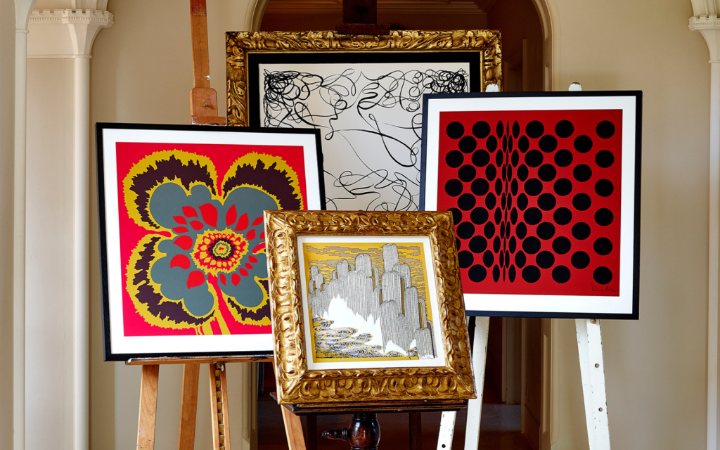 The silk scarf’s second life – from fashion icon to hospitality statement Collection of Richard Allan London scarf prints on easels