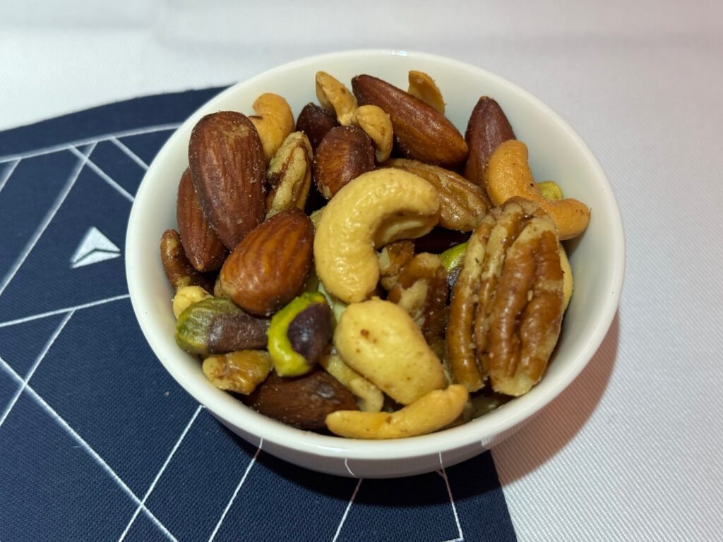 Hands Off My Nuts: First Class Needs More Warm Mixed Nuts, Not Fewer