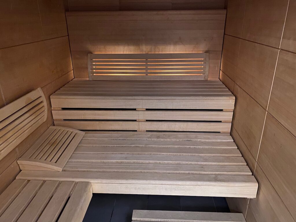 Air France Closes Paris Lounge Sauna After Passengers Apparently Turned It Into A Sex Den a wooden bench in a sauna
