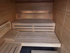 Air France Closes Paris Lounge Sauna After Passengers Apparently Turned It Into A Sex Den a wooden bench in a sauna
