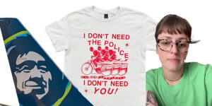 Alaska Airlines Passenger Ordered To Hide Pee-wee Herman Shirt With “I Don’t Need The Police” Slogan