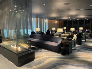 American Airlines’ Admirals Club Price Hike Makes Citi’s $695 Executive Card Look Cheap a room with a fireplace and couches
