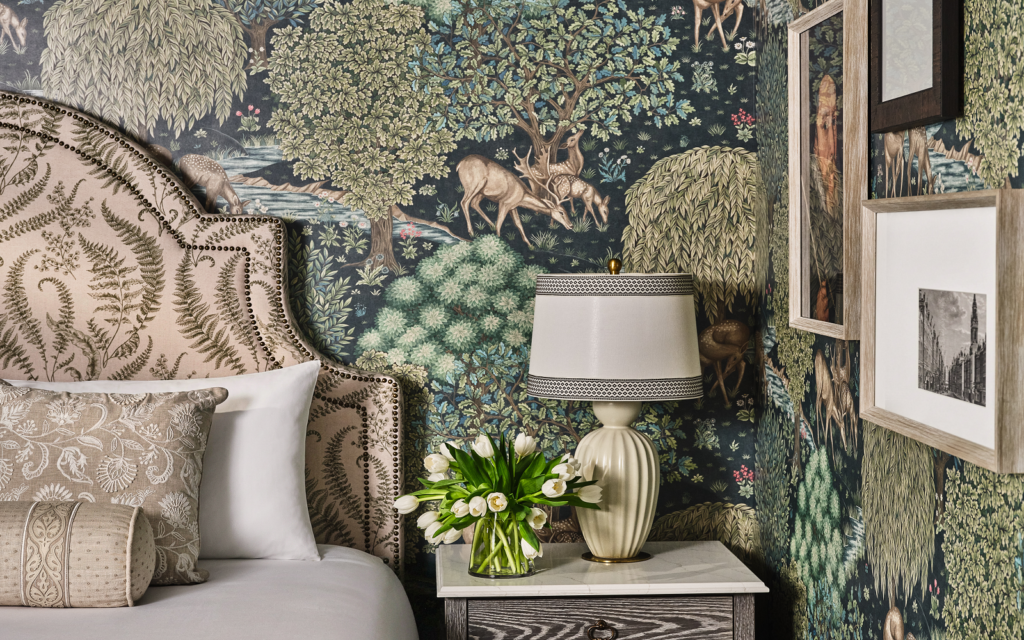 The Inn on Biltmore Estate – ROAM Interior Design takes on an American masterpiece bedroom detail at The Inn on Biltmore with morris wallpaper and upholstered bedhead - design by ROAM