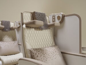Emirates Unveils New Premium Economy Seat: It Might Be The World’s Best New Emirates premium economy seat showing the adjustable divider lowered between seats