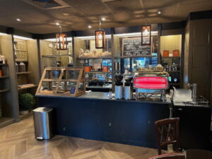 In Travel, Memorable Hospitality Happens At The Margins Complimentary coffee shop setup for guests at the Four Seasons Boston