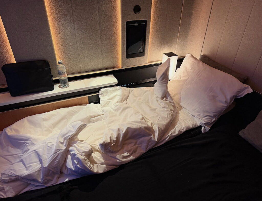 SWISS First Class Airbus A350 Review: A Double Suite In The Sky! Made-up bed inside the SWISS A350 first class double suite