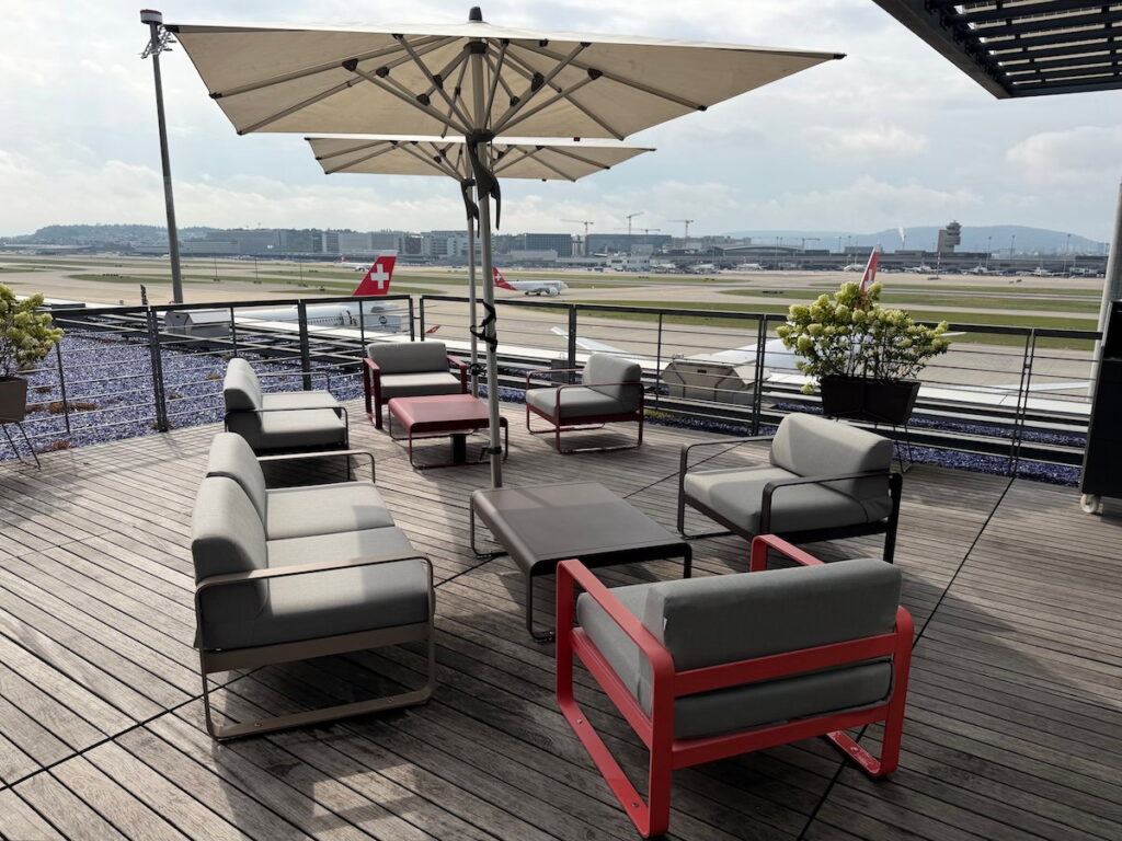Seating on the outdoor terrace of the SWISS First Lounge Zurich