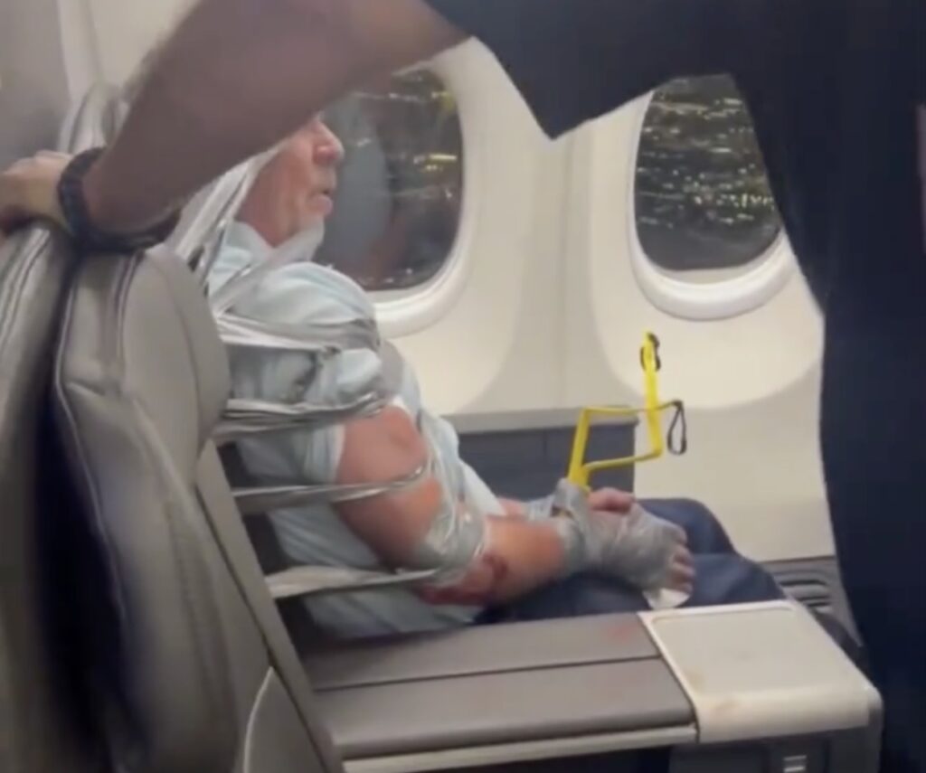 Crazed, Duct-Taped American Airlines Passenger Was Cursing Jesus, Not Preaching