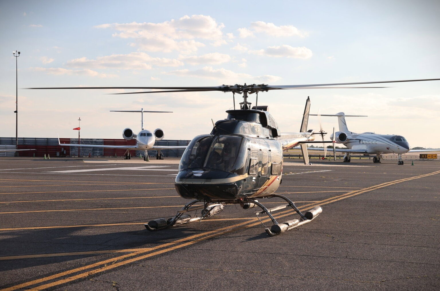 How To Use Bilt Cash For A Free Blade Helicopter Ride From Manhattan To JFK Blade Bell 407 helicopter parked at JFK Airport after arrival