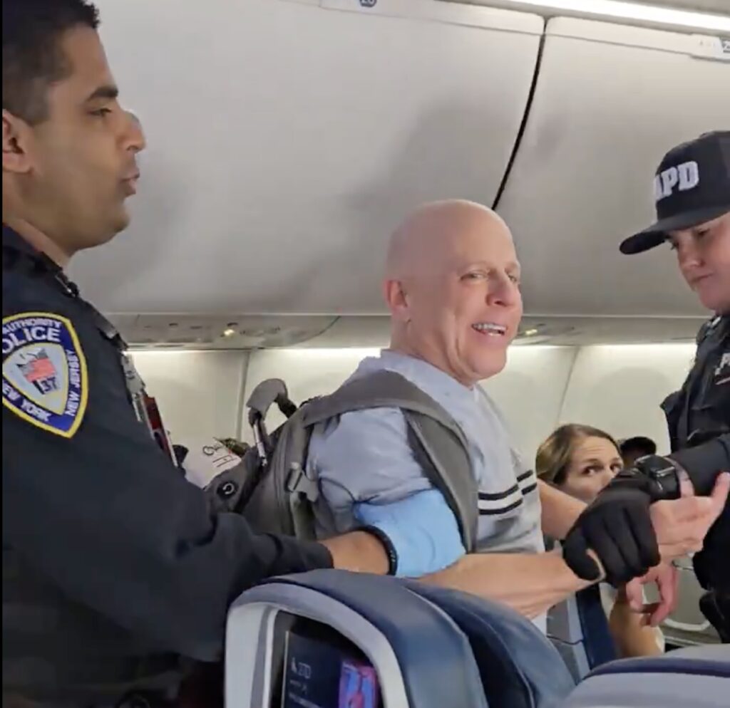 “Death To America!” Delta Air Lines Passenger Marched Off By Police After Vile, Racist Outburst