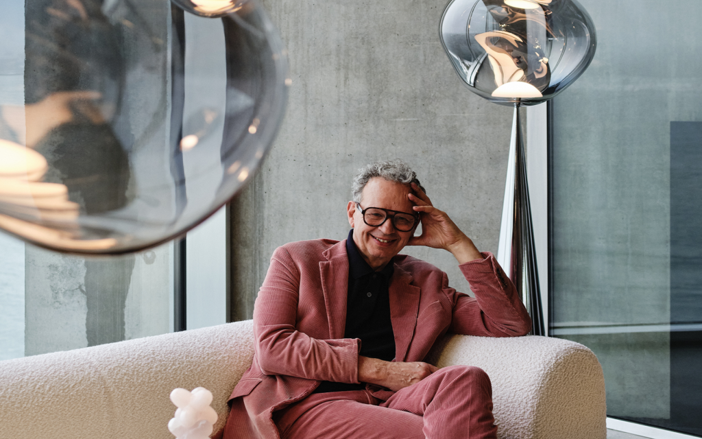 SANIPEX GROUP announces partnership with Tom Dixon designer Tom Dixon on a couch discussing SANIPEX collaboration